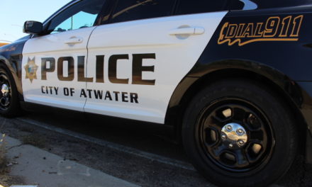 Vehicle crashes into parked vehicle, sign, and tree in Atwater