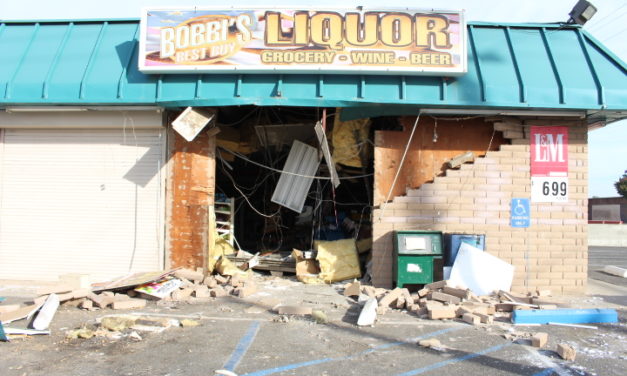 Stolen Freightliner water truck crashes into liquor store in Atwater