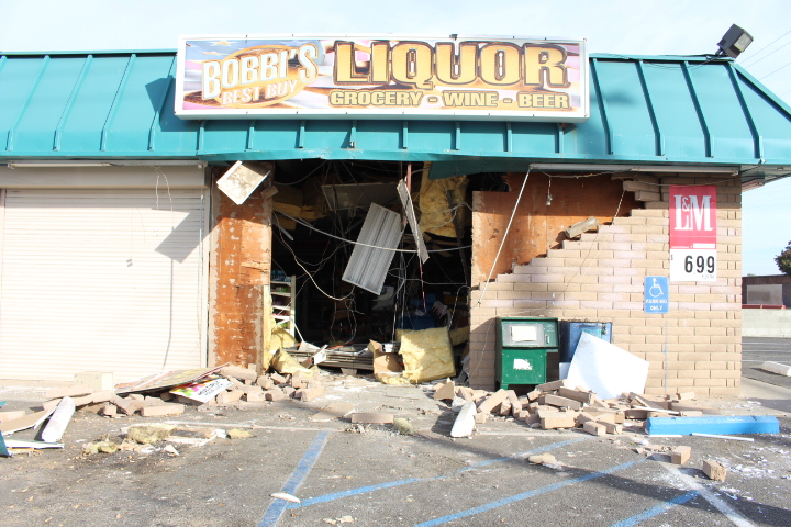 Stolen Freightliner water truck crashes into liquor store in Atwater