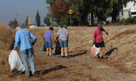 Volunteers clean-up walking, bike path in Merced
