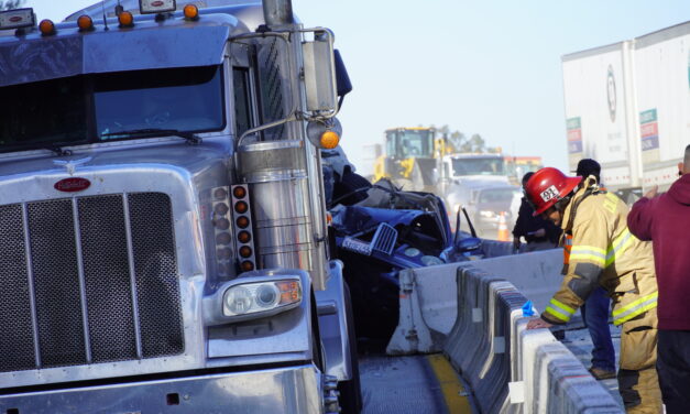 Vehicle pinned between two big rigs in Atwater, man airlifted